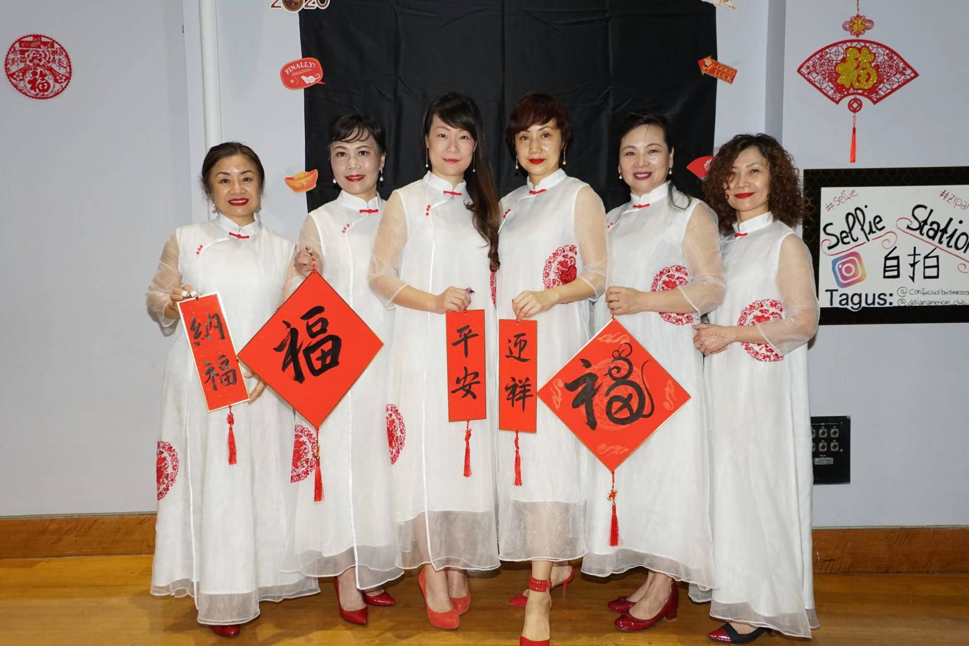 Guzheng group posing with banner